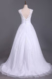 2024 Wedding Dresses A Line Open Back Scoop Tulle With Applique PKSXHPF9